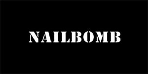 NAILBOMB - Logo - široká chrbtová nášivka s rozmerom 33 x 15 cm